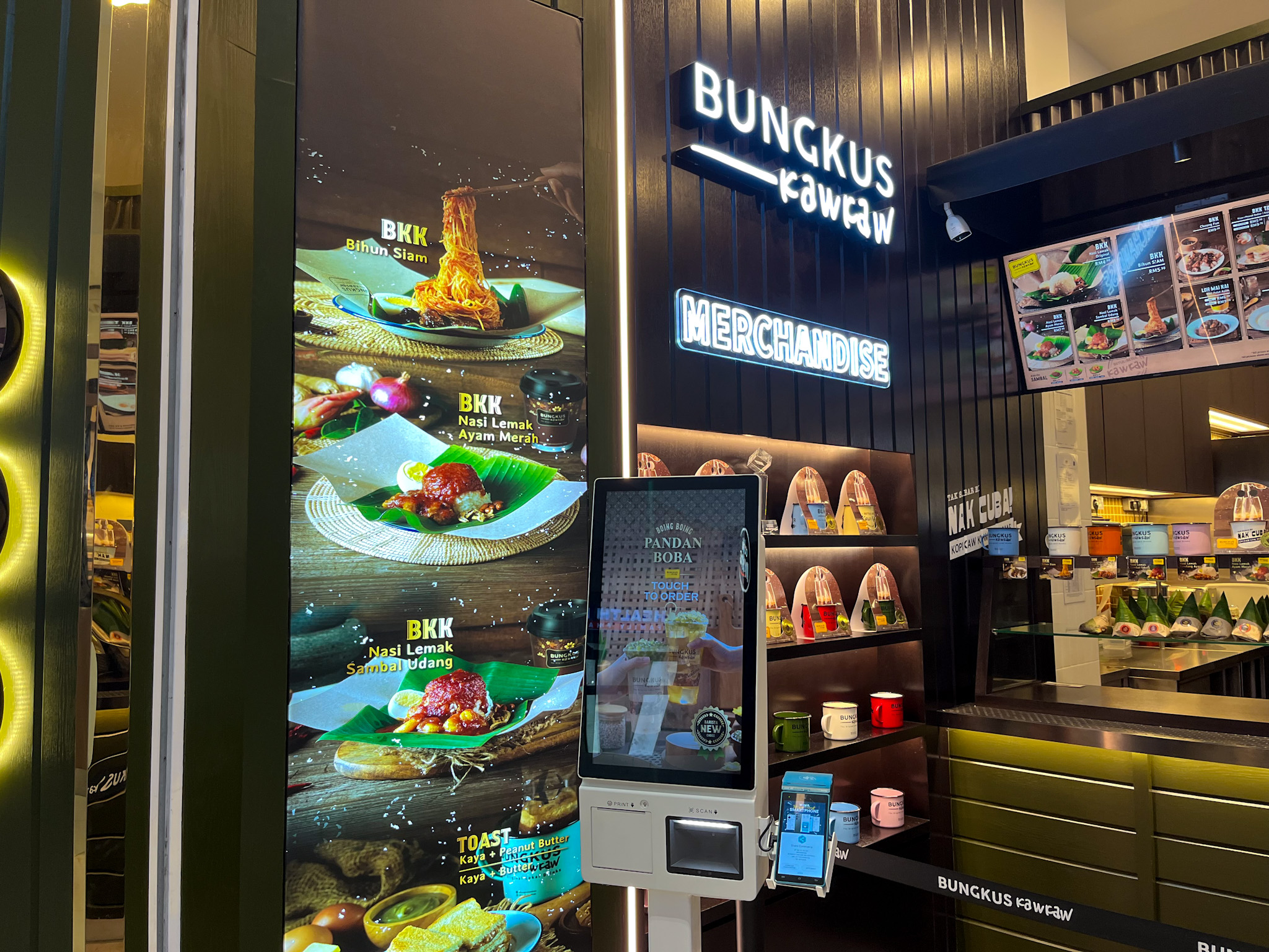 Bungkus Kaw Kaw Mula Memperkenalkan Kiosk Layan Diri Secara Berperingkat